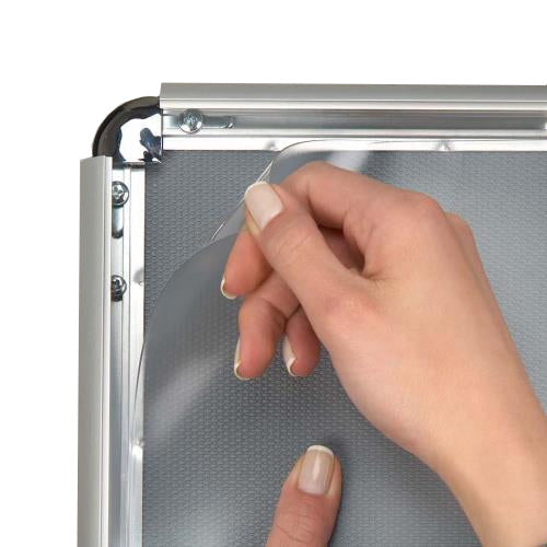 Protective Non-Glare Overlay is included with 20x30 Rounded Corners Snap Frame. Protects Poster, Sign, Graphics and Photographs from Dust and Scratches.